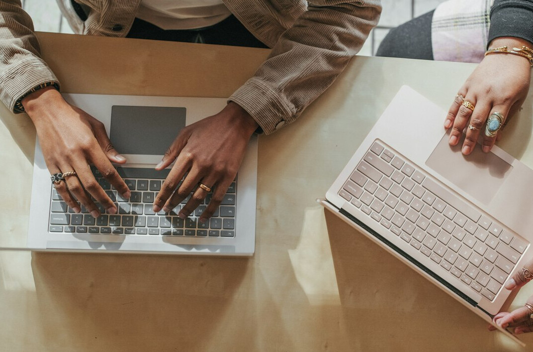office workers using laptop